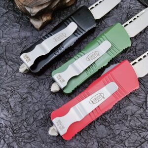 zinkhandtag Microtech mini Dragon OTF-kniv