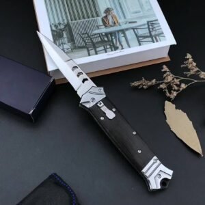 Ny version av Bouncy Fish, sidöppnande, med brunt handtag eller Chicken Wing-trähandtag automatkniv
