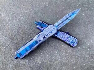 zinkhandtag Microtech Dalong blå titan OTF-kniv